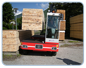 Large long wood loads stored and transported with SLL sideloader